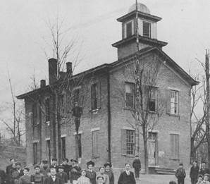 A group of people outside a school

AI-generated content may be incorrect.