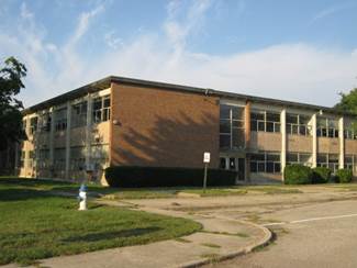 A building with a fire hydrant

AI-generated content may be incorrect.